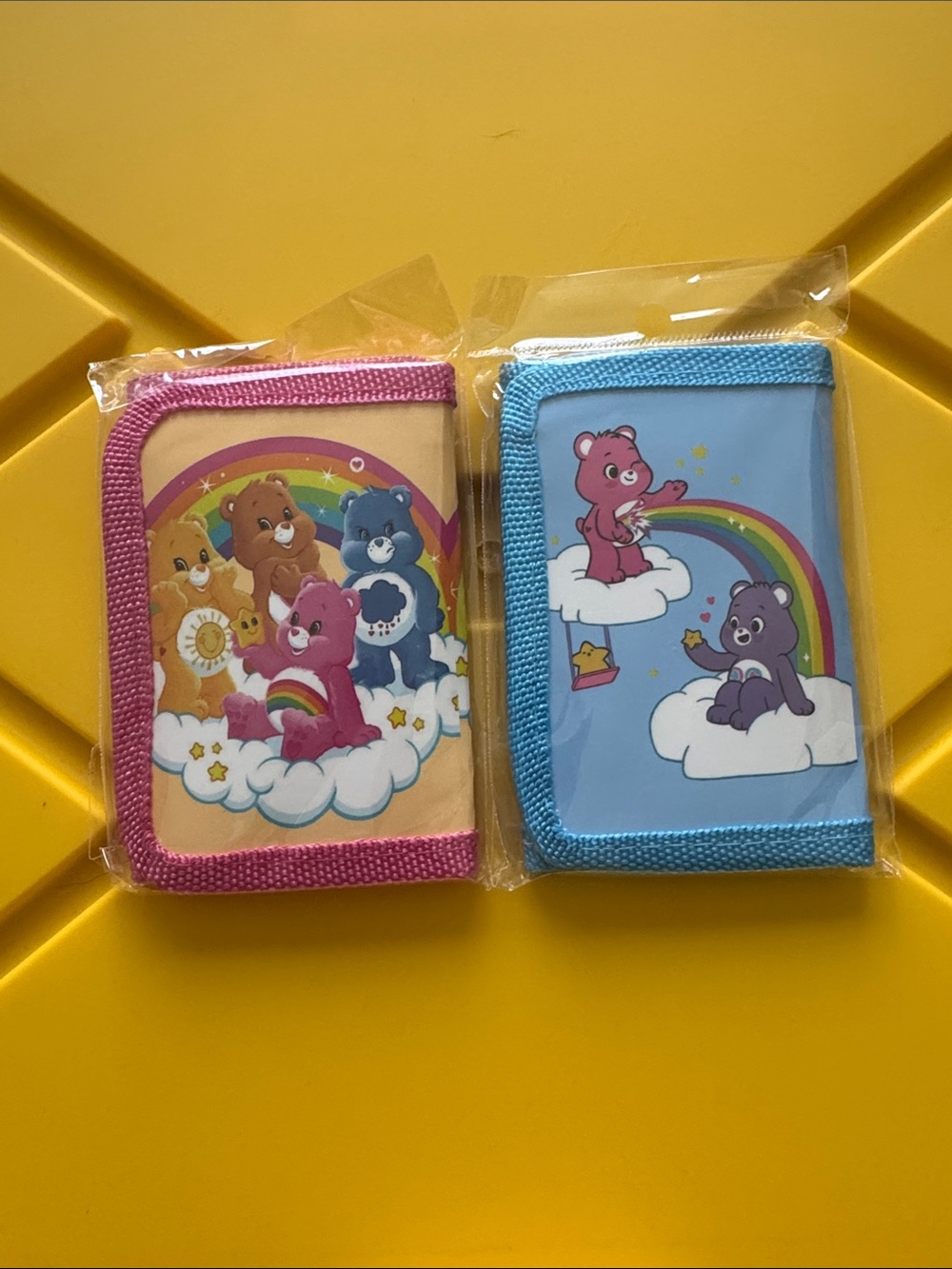 Care Bears Pink and Blue Zip Wallets with Rainbow Art
